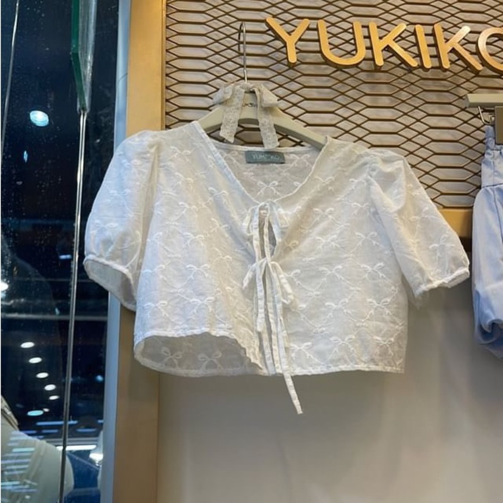 Eyelet tie front ribbon top